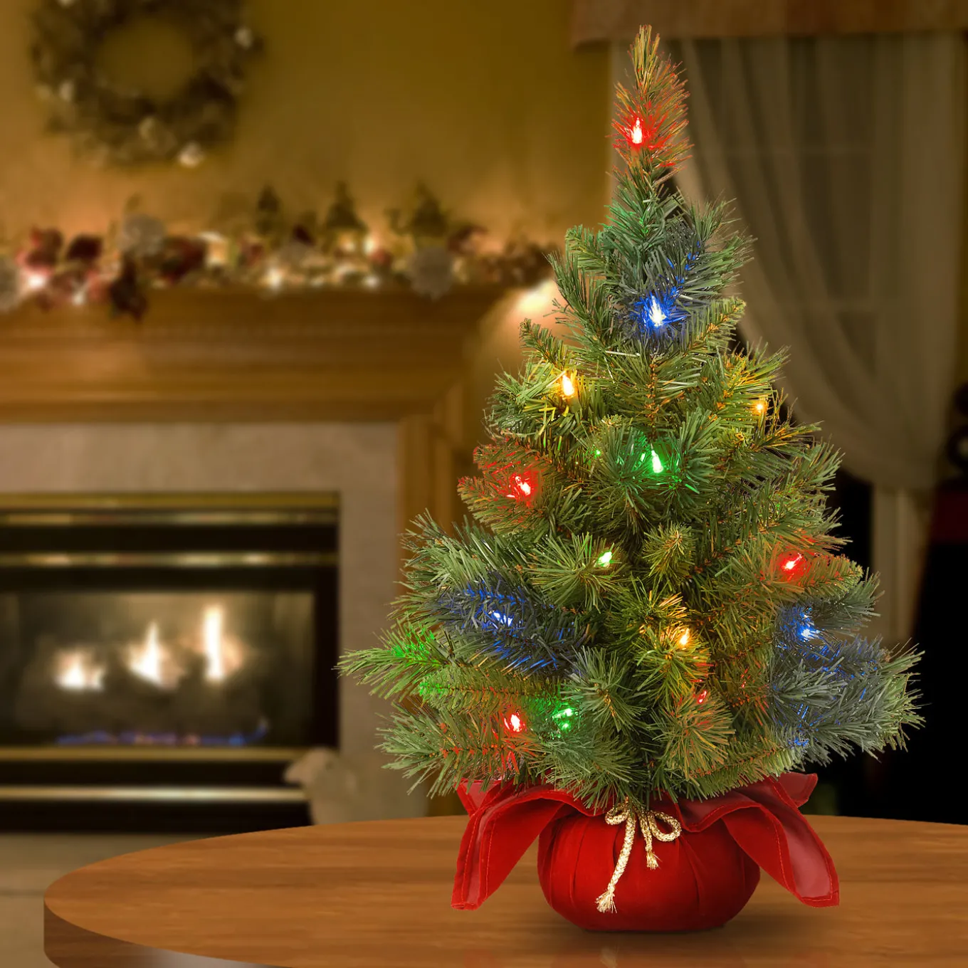 2 ft. Pre-Lit Majestic Fir Tree with Multicolor LED Lights, Red Base