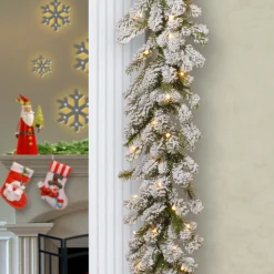 9 ft. Pre-Lit Snowy Sheffield Spruce Garland with Clear Lights