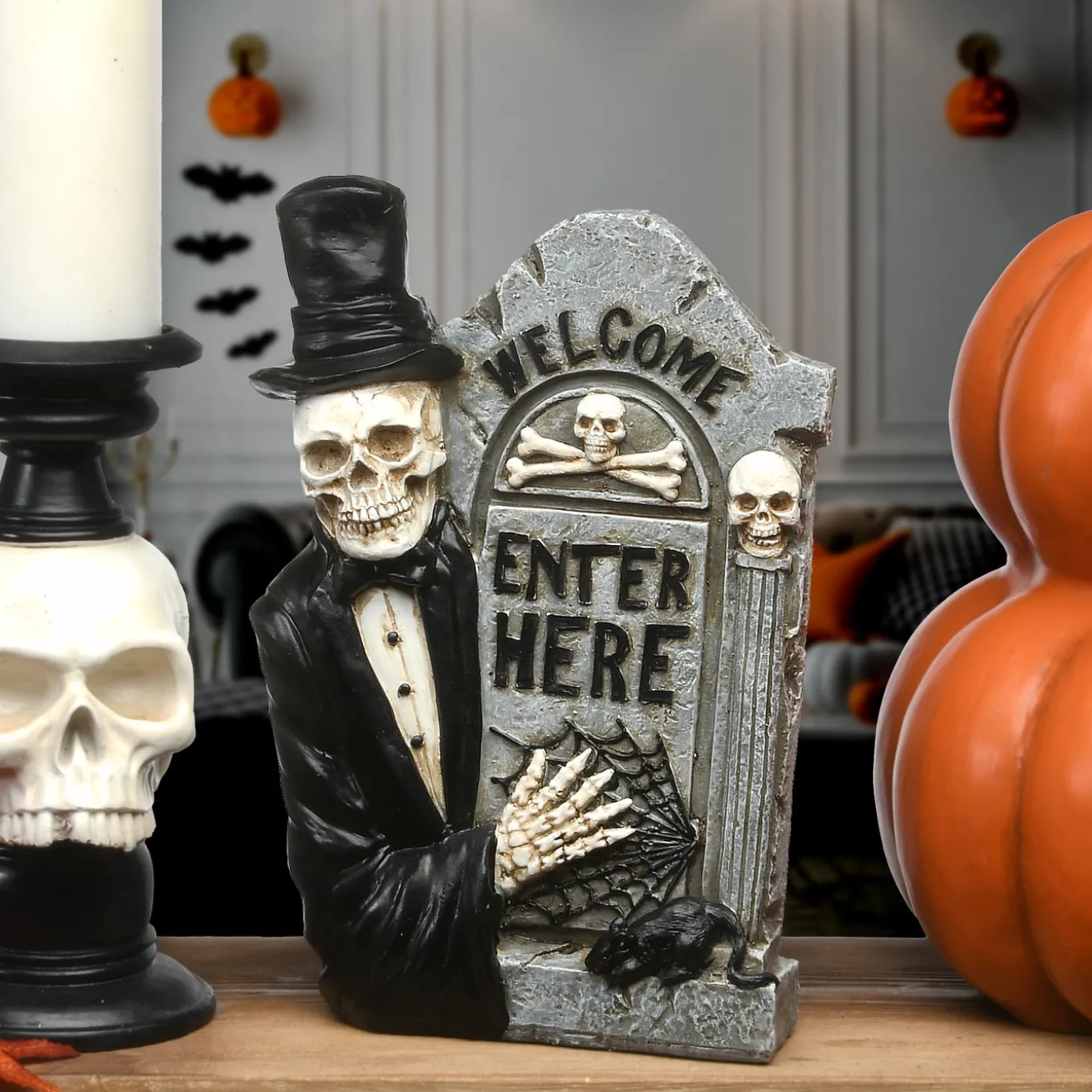 12 in. Halloween Skeleton Holding a Tombstone Decoration