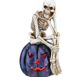 11 in. Halloween Skeleton Resting on a Purple Galaxy Jack O Lantern