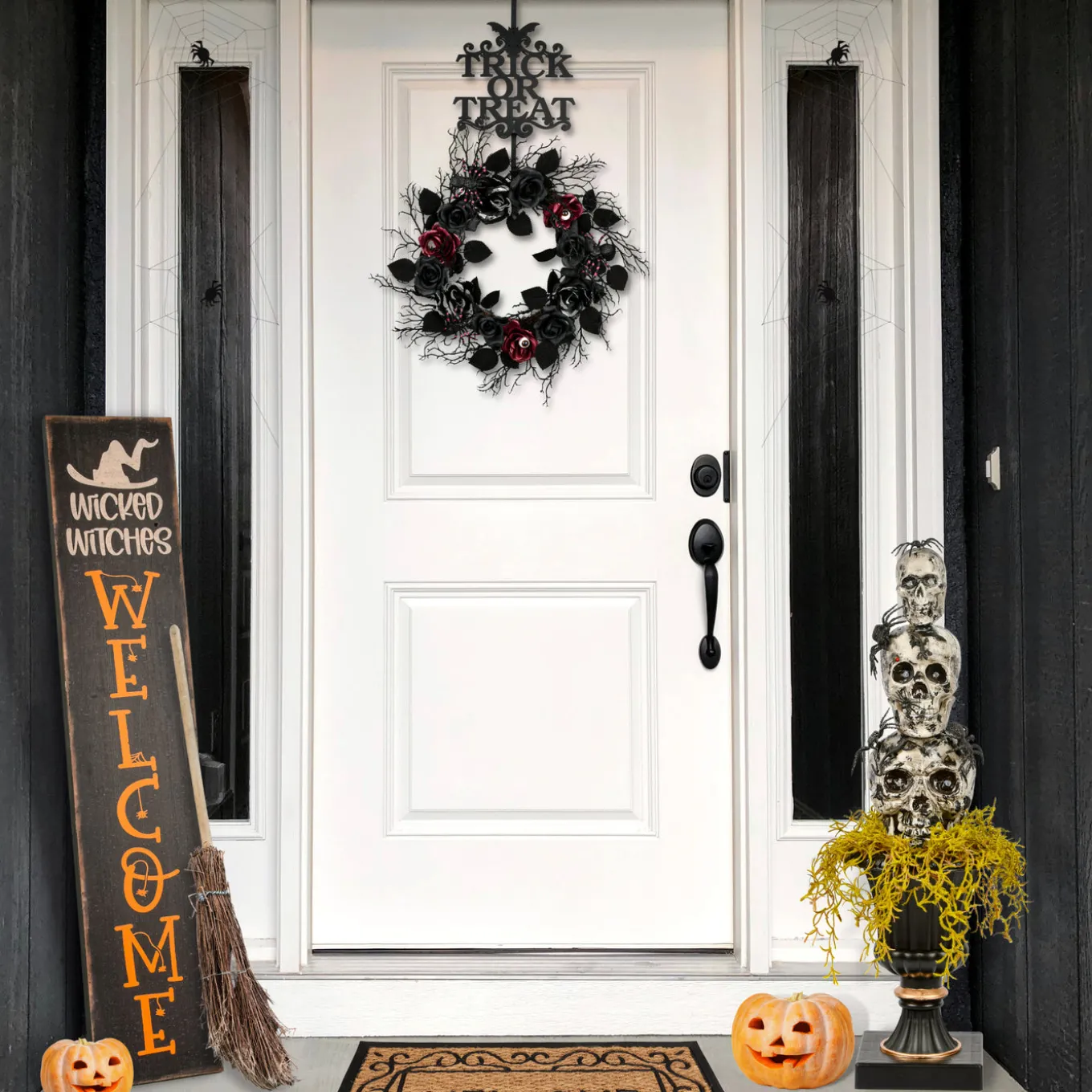 32 in. Halloween Skull Tower with Spiders Tabletop Decoration in a Black Urn