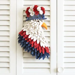 14 in. Patriotic Hanging Eagle Decoration with Red White and Blue Wood Cuts and Flower Blooms