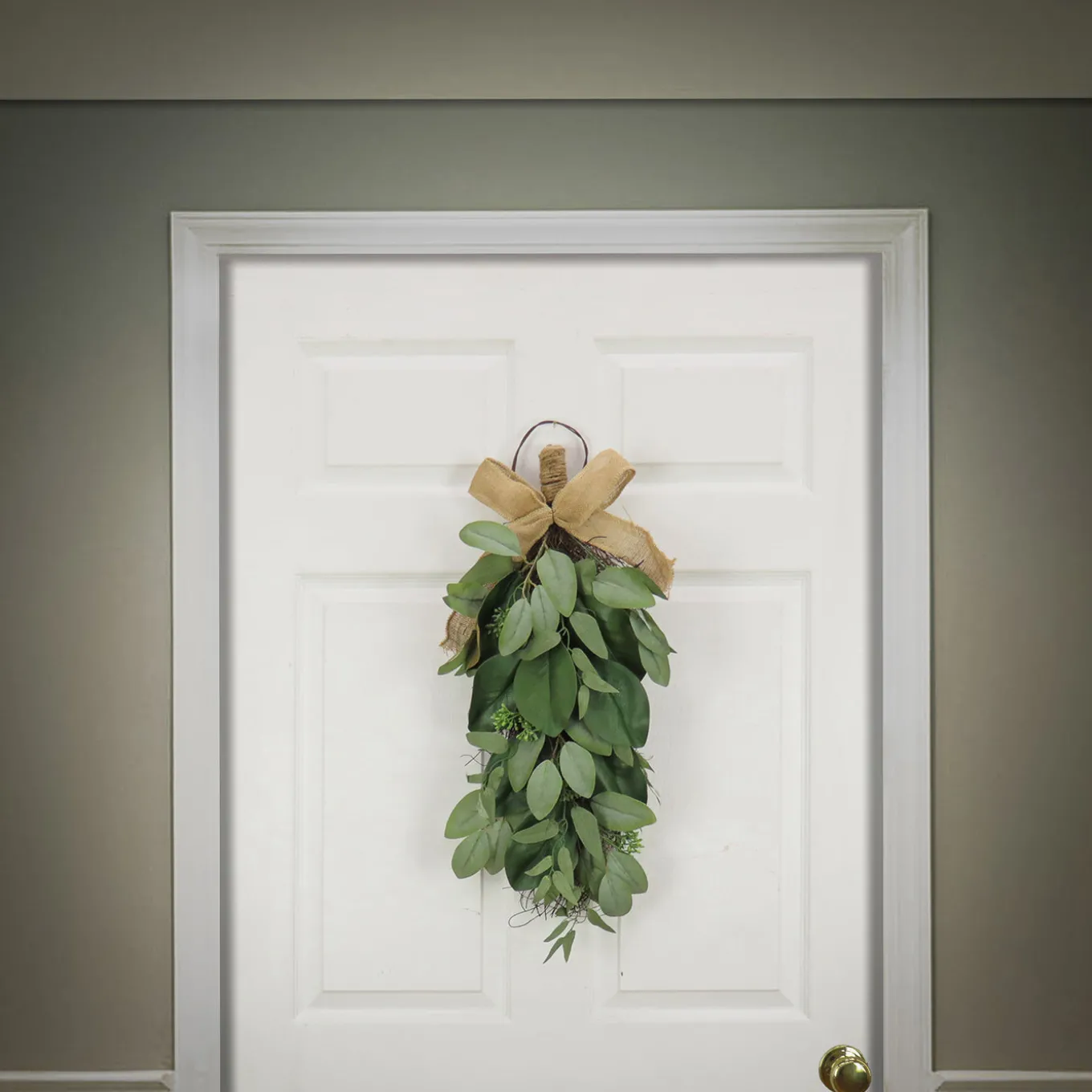 26 in. Spring Teardrop Wall Hanging Decoration with Eucalyptus Leaves, Magnolia Blooms, Flowing Green Stems