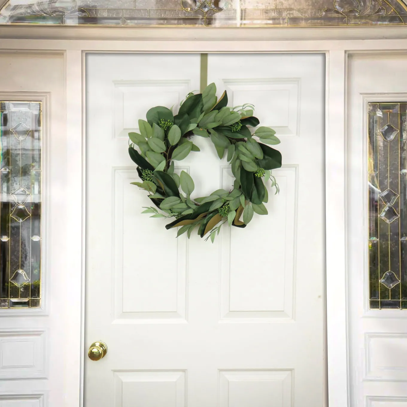 22 in. Spring Wreath with Eucalyptus Leaves, Magnolia Blooms, Flowing Green Stems